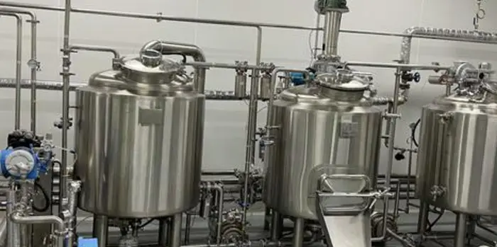 FFU T grid ceiling system installed above a dairy filling line